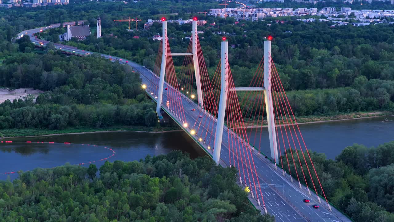Aerial view of Siekierkowski bridge over Vistula in Warsaw, evening traffic