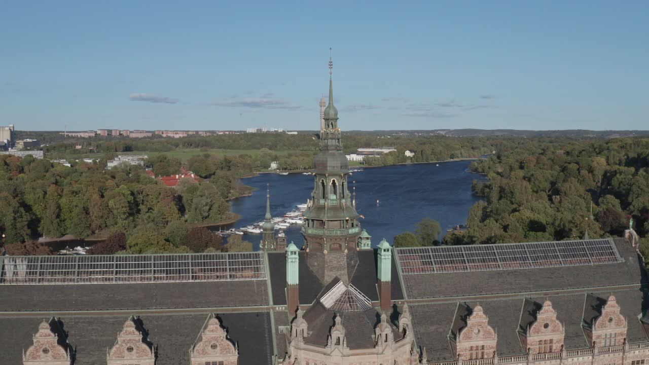 Aerial view of Nordiska Museet with Kakn&auml;stornet in background on sunny evening on Djurg&aring;rden in Stockholm, Sweden