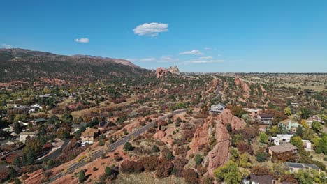 aerial establishing overview of garden of the gods colorado in the fall