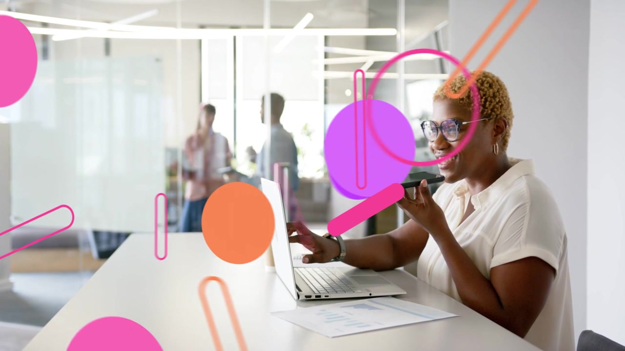 Office worker typing and tapping phone for meeting, animated shapes covering laptop and glass wall