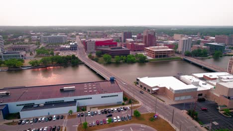 Inspiring-and-vibrant-aerial-while-cars-driving-on-Chestnut-Street-Bridge-overpass-from-Rockford-Illinois