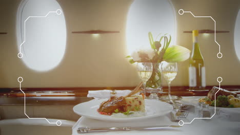 gourmet meal and wine served on luxury flight with digital interface animation