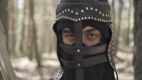 Medieval-soldier-with-a-helmet-on-his-head.