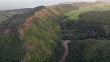 Dramatic-aerial-footage-of-famous-Wailua-River-durig-sunset,-sunrise
