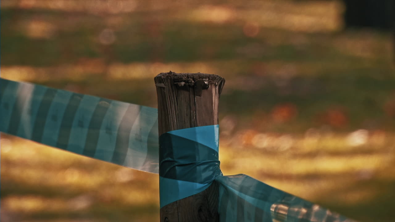 Close shot of a demarcation at a cross country bike race track.