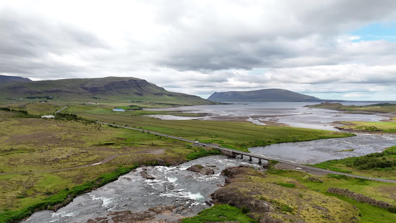 Aerial view of Hvalfjörður fjord in Vesturland Iceland, showing calm waters, surrounding mountains, and expansive Icelandic landscape from above