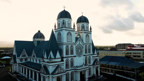 immaculate conception cathedral in apia, samoa at sunset - aerial drone shot