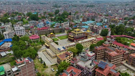 Shechen-Monastery-With-Cityscape-In-Tushal-Mahankal-Road,-Kathmandu,-Nepal