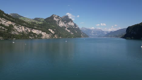 natural landmark in europe offers scenic alpine mountain landscape of village in alps switzerland to visit viewpoint of nature side lake and hiking route blue walensee weesen walenstadt amden