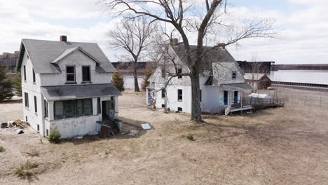 old, rundown, abandoned homes sit empty at wisconsin point along lake superior