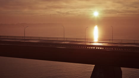 sunset over a bridge