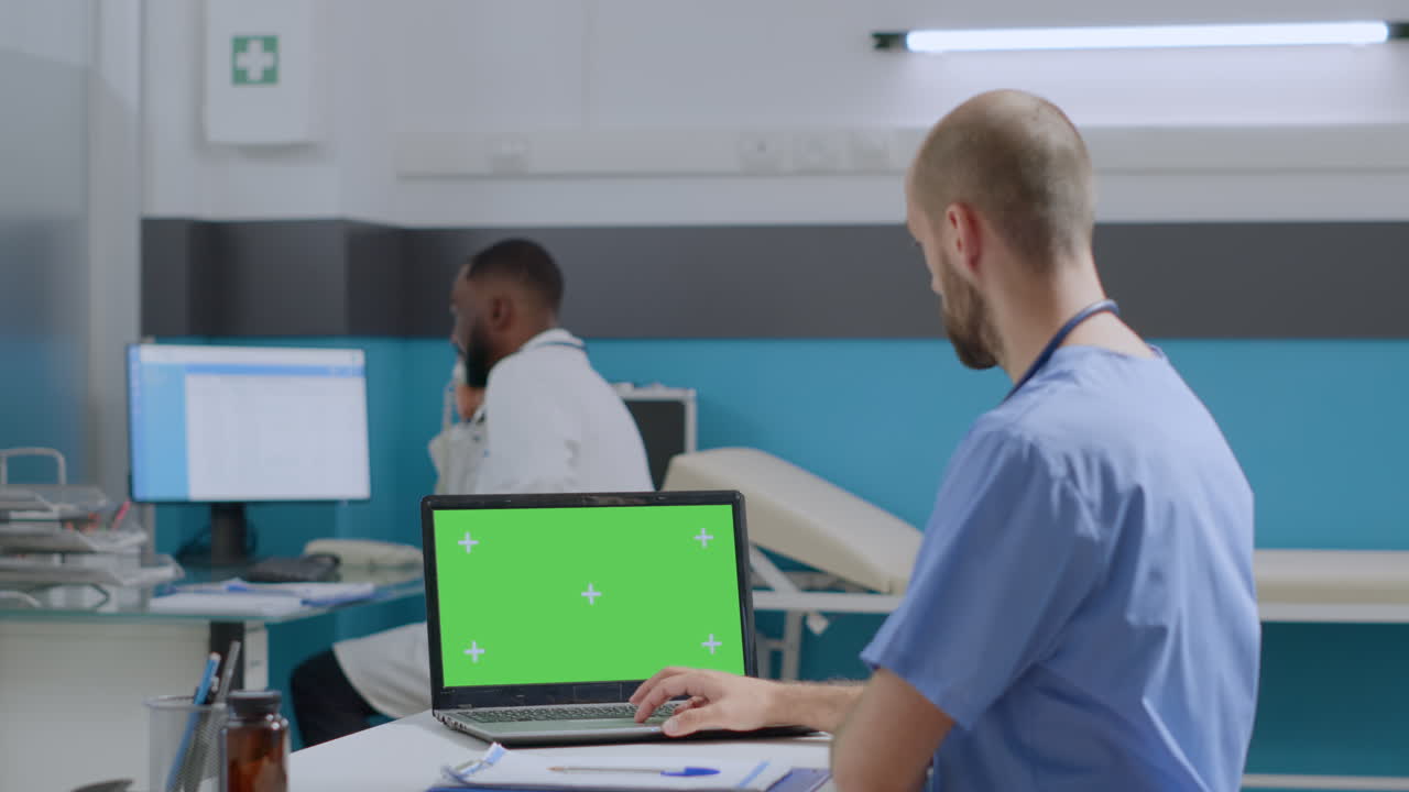 Medical Professionals Using Technology in a Clinic