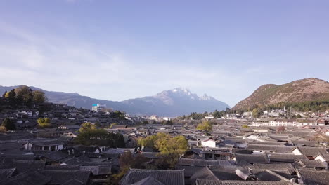 4K-Lijiang-Town-with-Jade-Dragon-Snow-Mountain-View,-Yunnan,-China