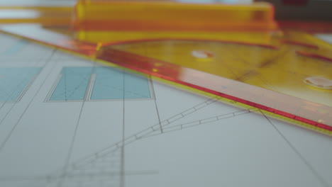 architectural blueprint with drafting tools
