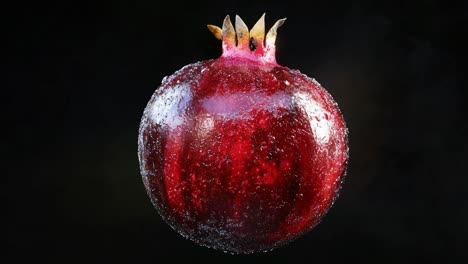 close-up of a wet red fruit