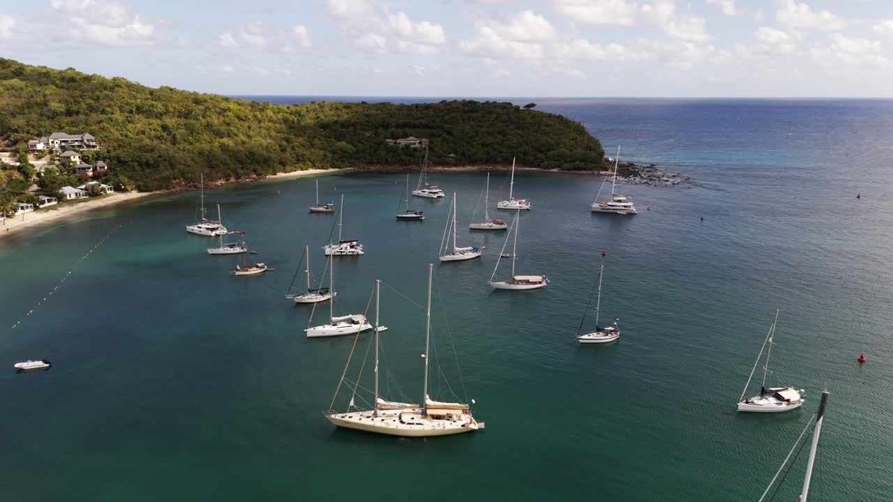 Aerial View of Sailboats in a Tropical Bay