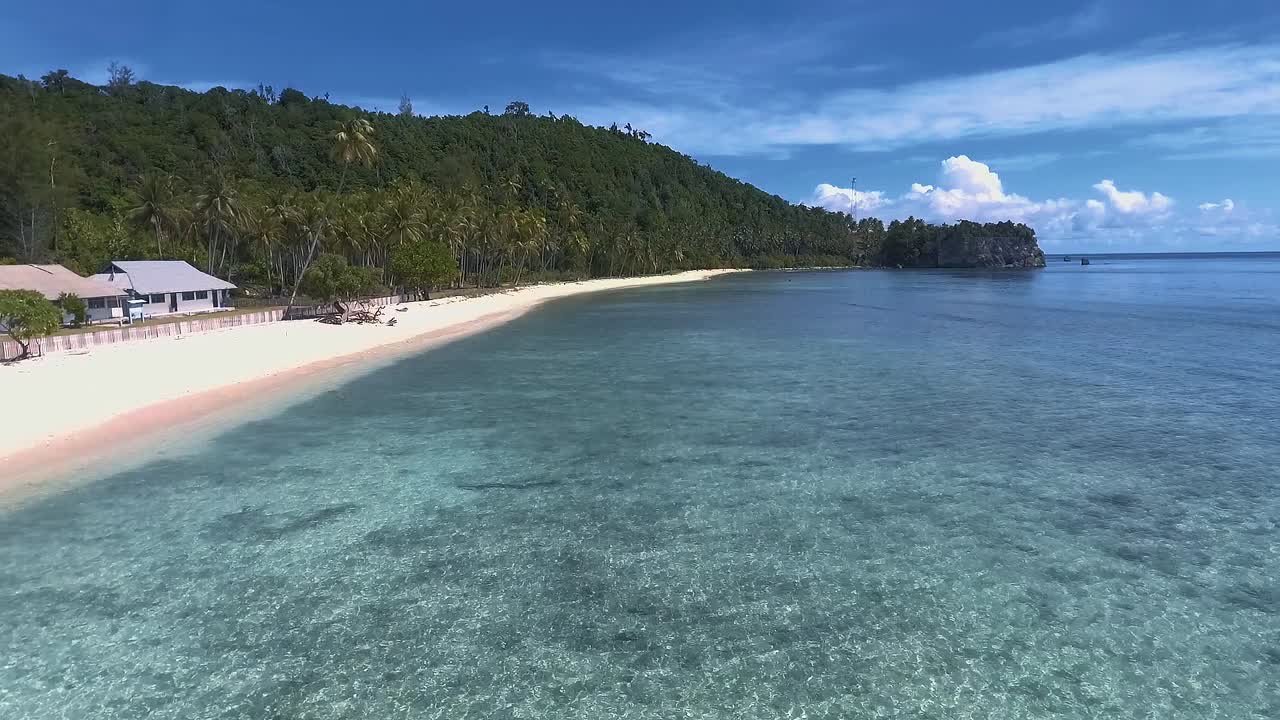 Capture in low over transparent waters in North Maluku, Indonesia.
