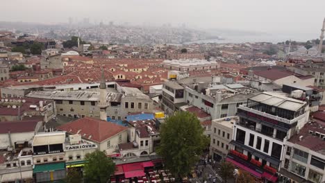 top down view of grand bazaar with mosque and city in the background