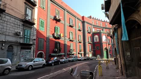 a busy street with cars and pedestrians