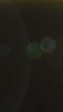 animation of green glowing light on brown background