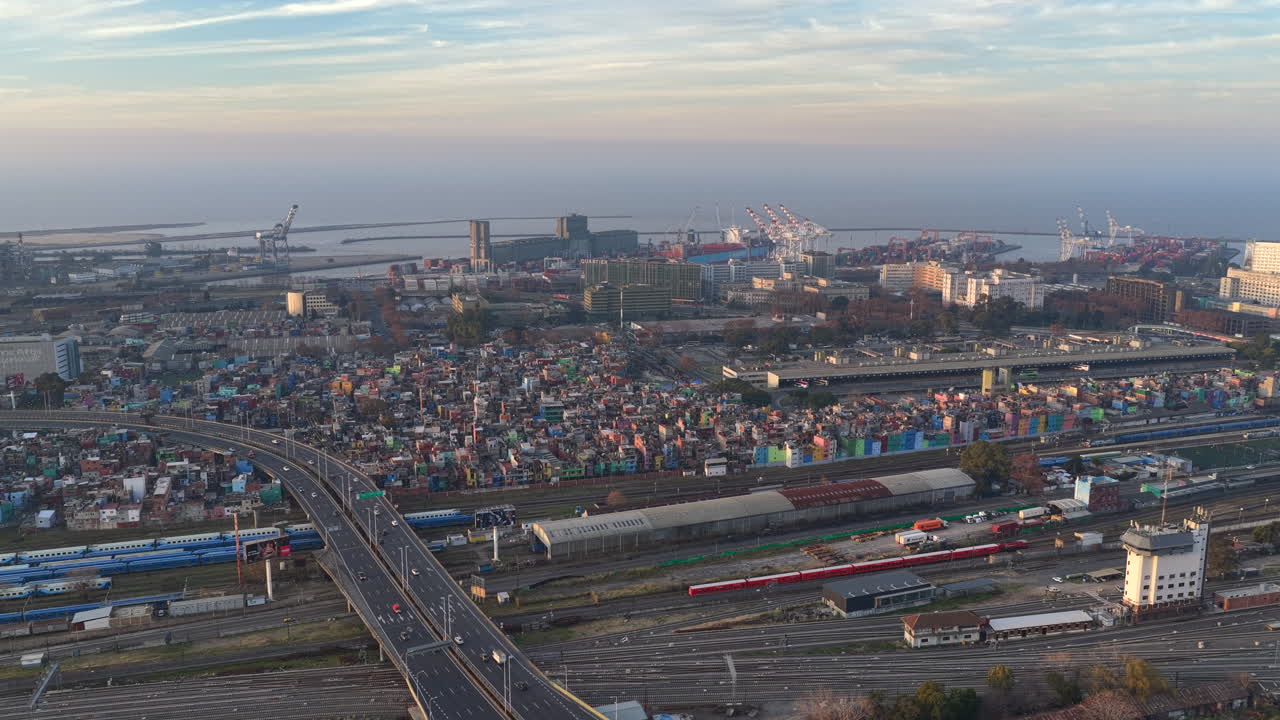 Aerial view of Villa 31 and Buenos Aires port with Río de la Plata in the background