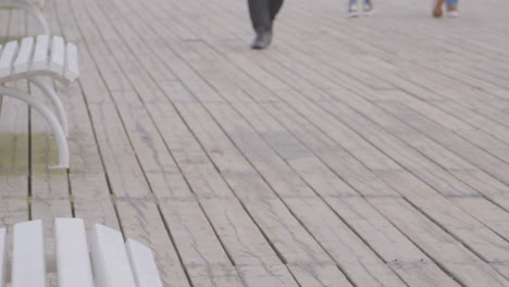 walking at wooden promenade at redlowo seaside in gdynia, poland