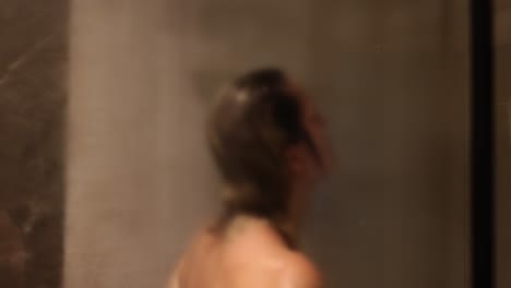 blurred view of person in a steamy shower