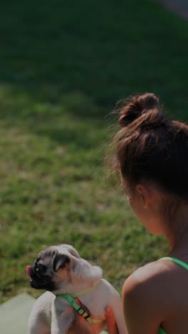 woman exercising outdoors with her dog