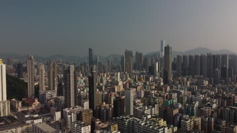 an early afternoon drone flight with downward pan over kowloon hong kong china