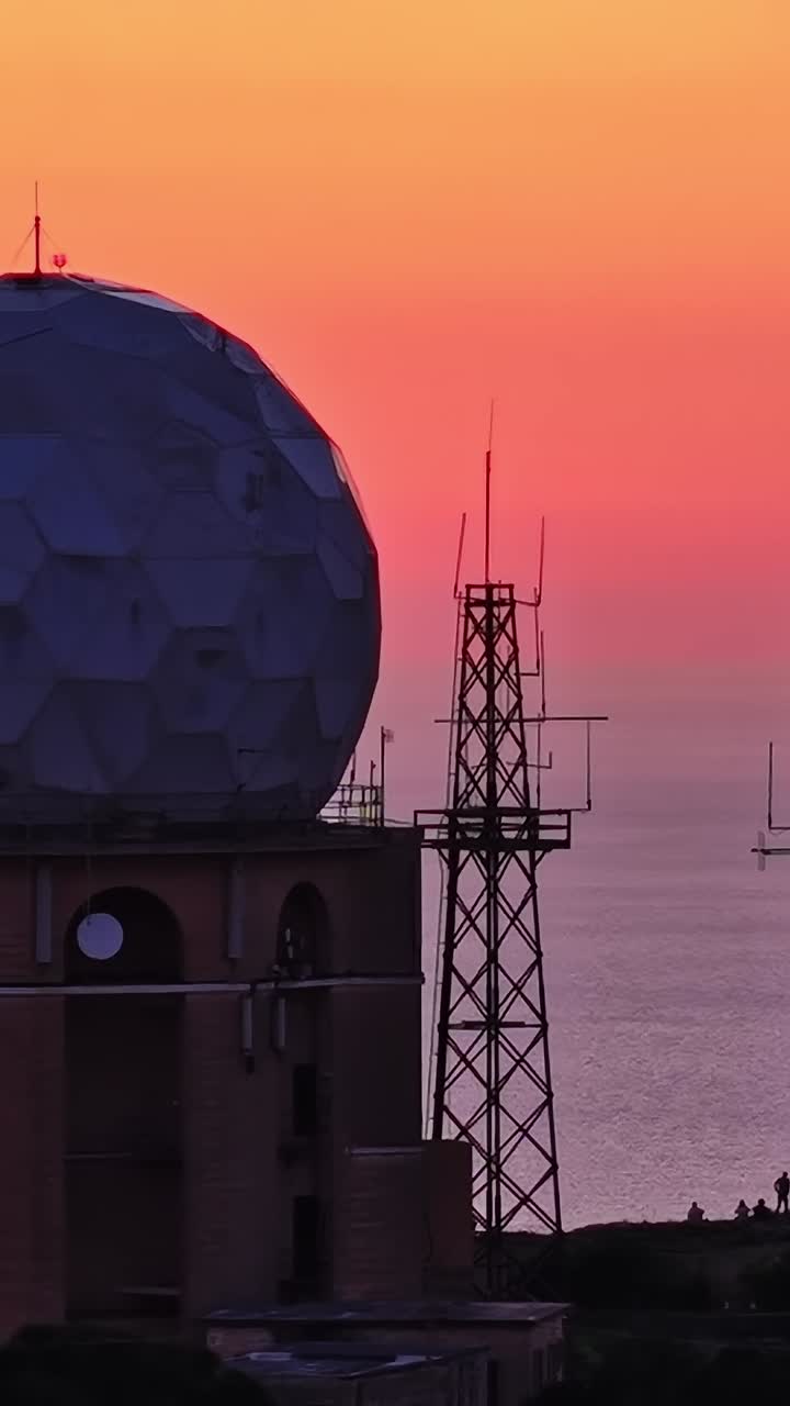 Sunset view over communication towers in Malta