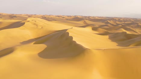 astonishing aerial shot over the vast sand dunes of the namib desert along the skeleton coast of namibia 3