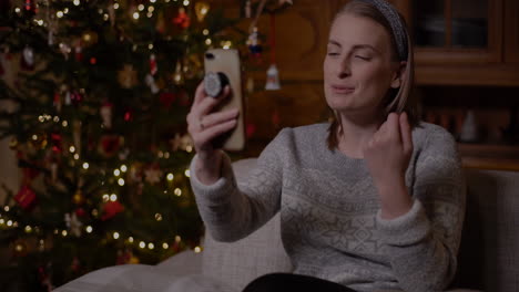 Positive-Woman-Video-Chatting-Christmas-Smartphone-3