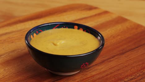 chicken nuggets dipped in mustard sauce
