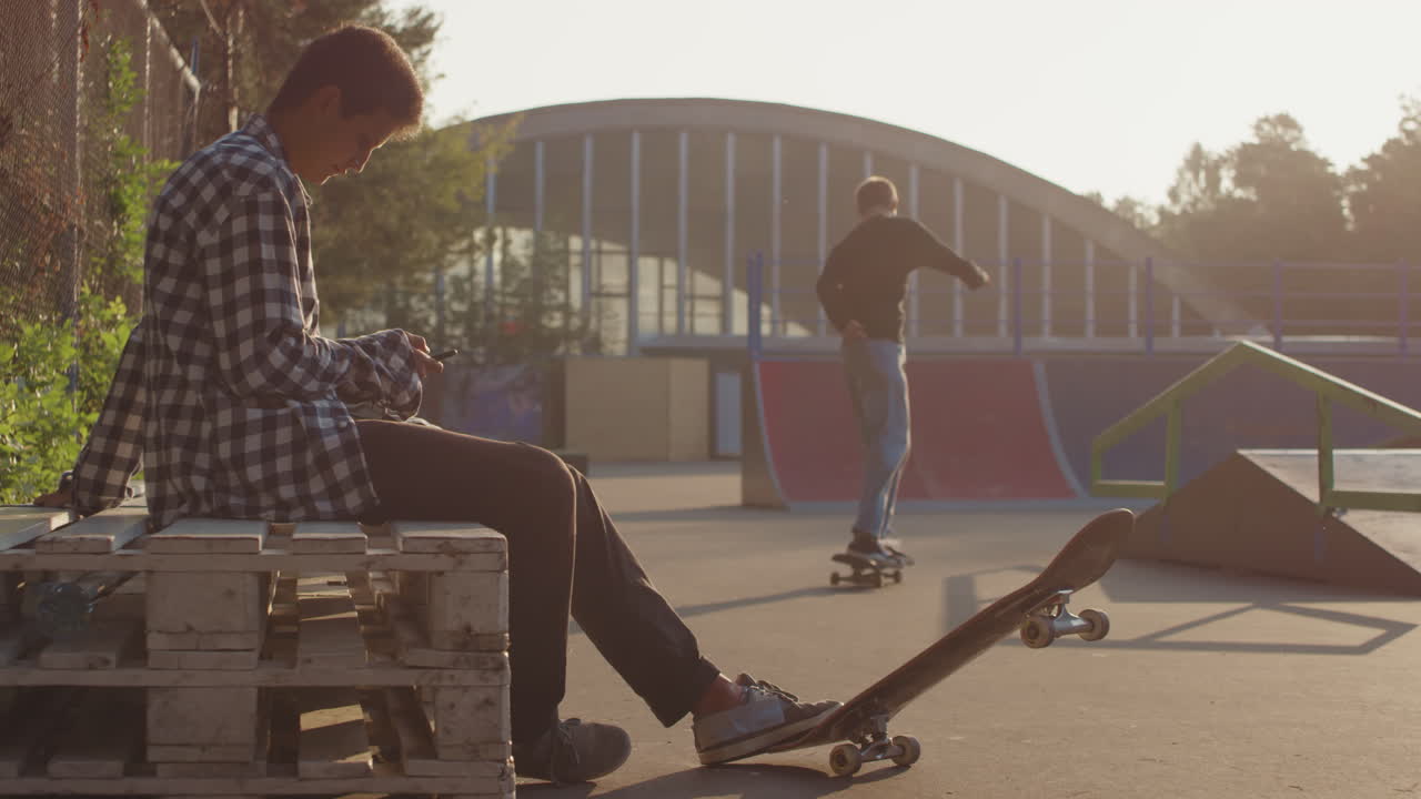 Teenagers Hanging Out in Skatepark
