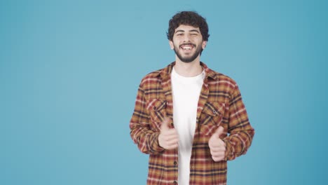 Apuesto-Joven-Barbudo-Bailando-Con-Felicidad-Y-Alegría.-El-Estudiante-Está-Bailando.-Señalando.