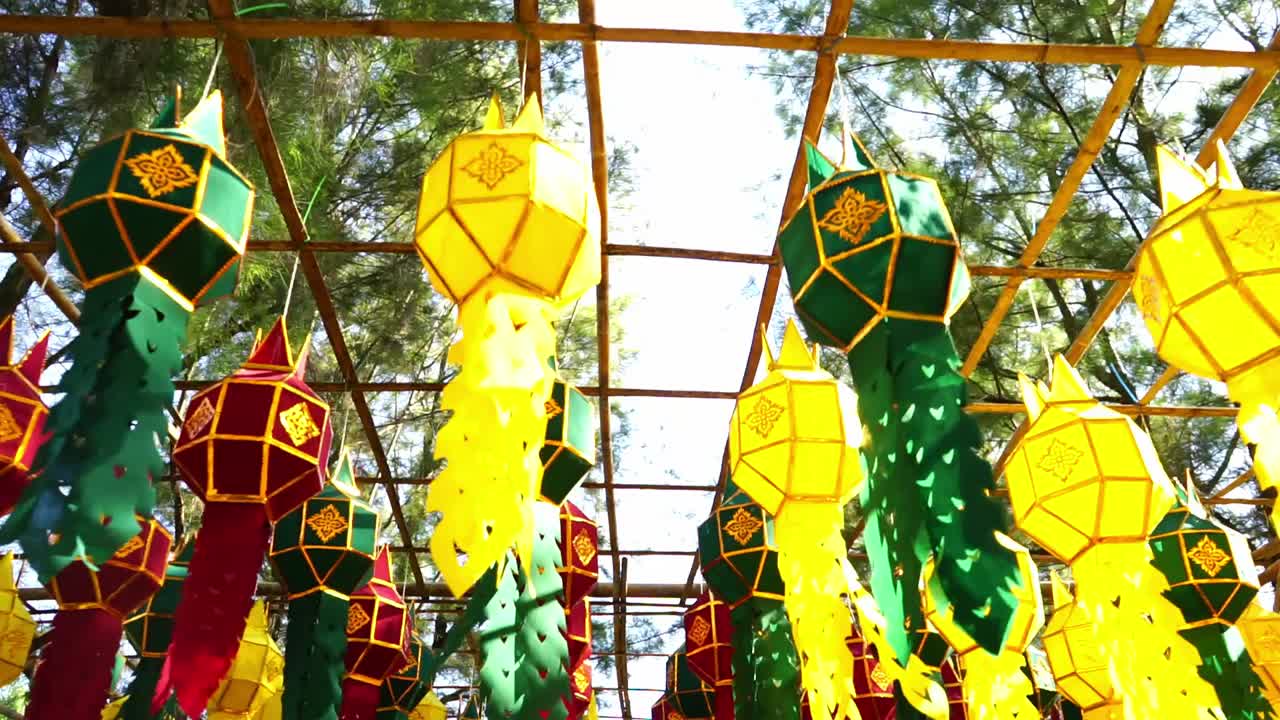 colorful lanterns made of paper decorates the street. a refreshing sight to see.