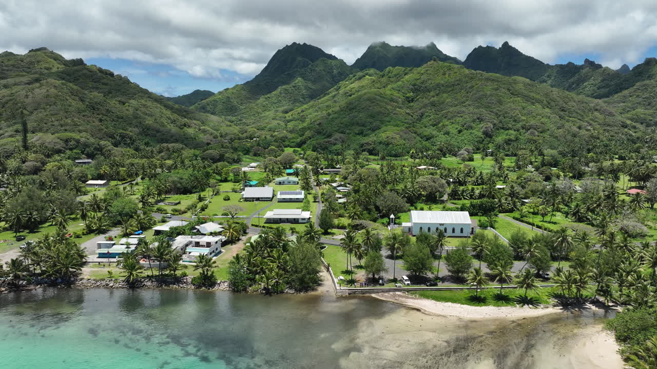 Avana Passage harbor in Rarotonga Cook Islands by Garden of Seven Stones, medium aerial establishing