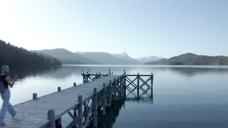 AERIAL---Pier-on-Espejo-Lake,-Andes-Mountains,-Neuquen,-Patagonia,-Argentina