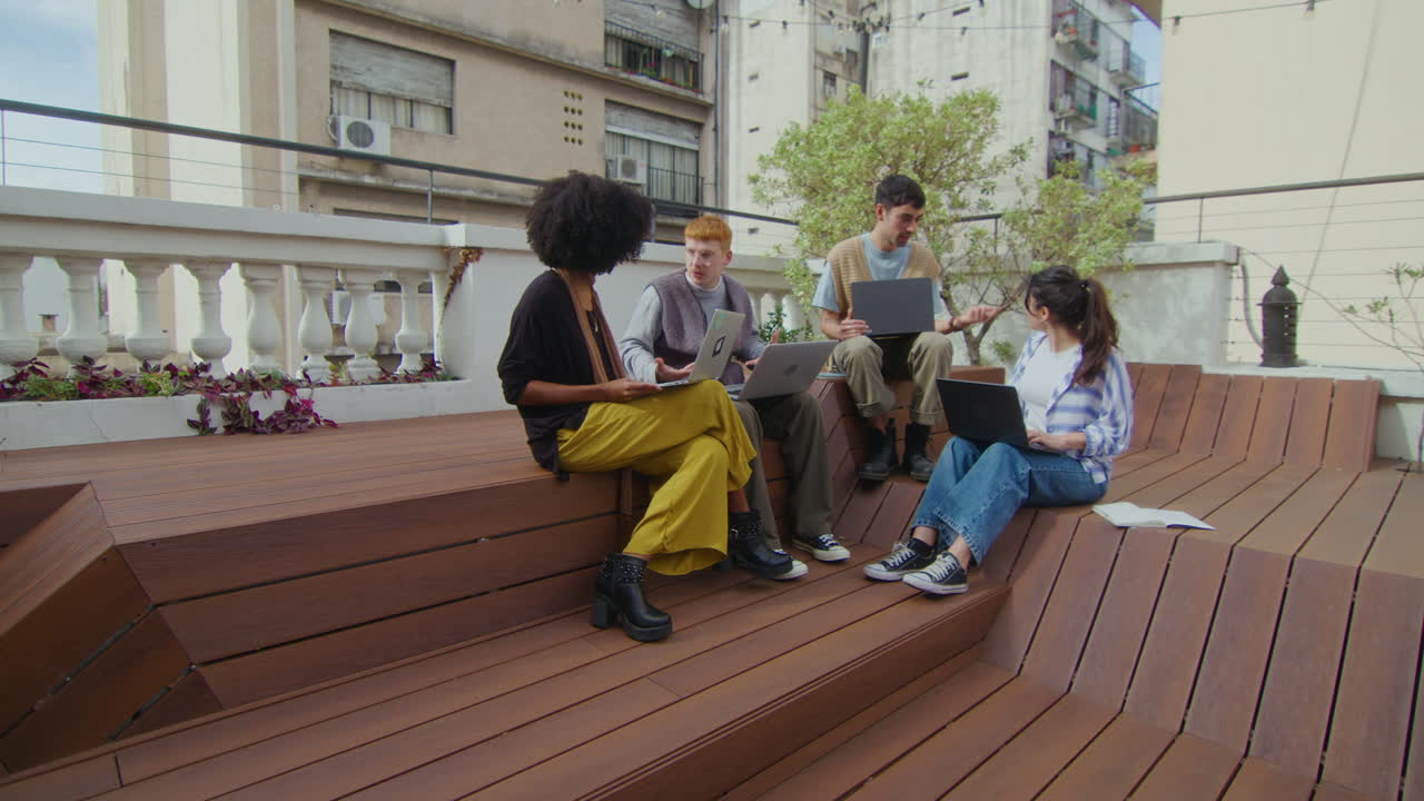Gen Z Business People Collaborating at Outdoor Coworking Space