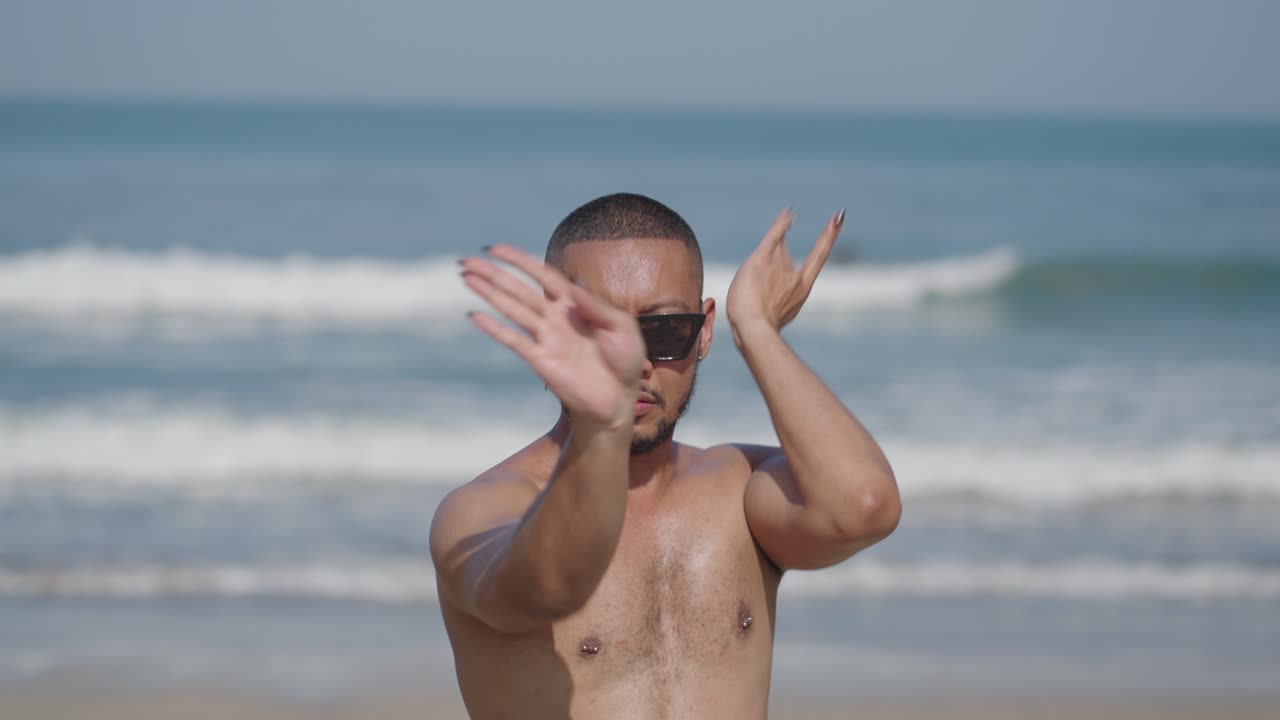 Man Posing on a Beach