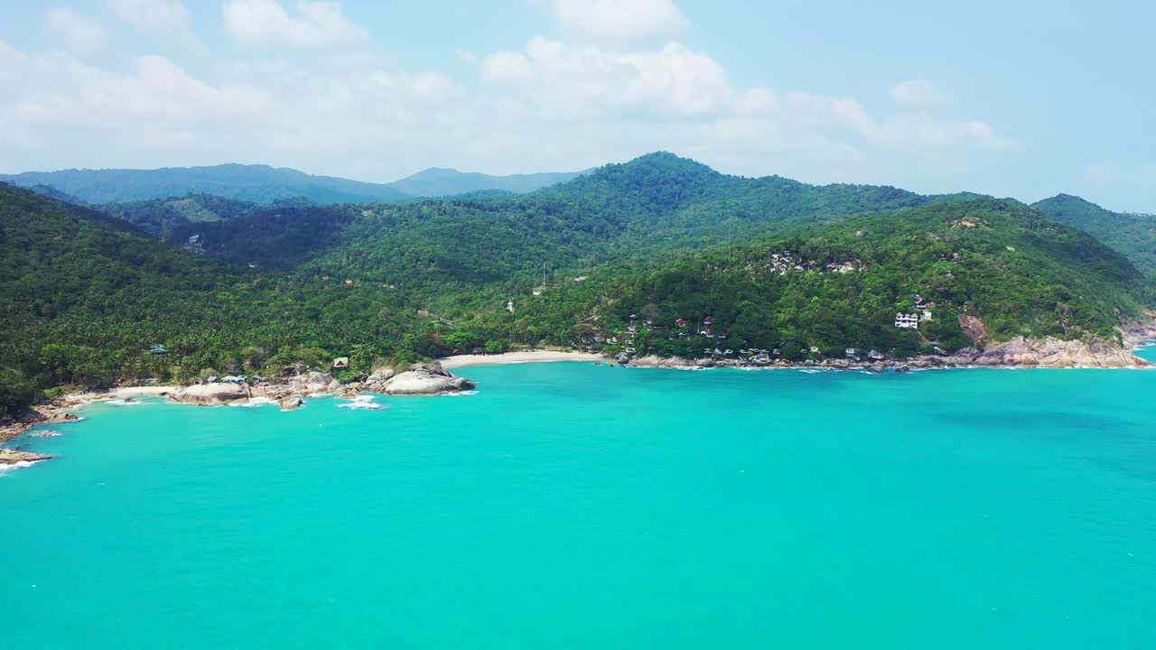 Rocky forested shore between two sandy beaches, Haad Thong Reng and Haad Than Sadet, Thailand