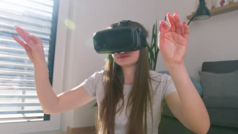 woman with vr goggles interacting around the virtual environment