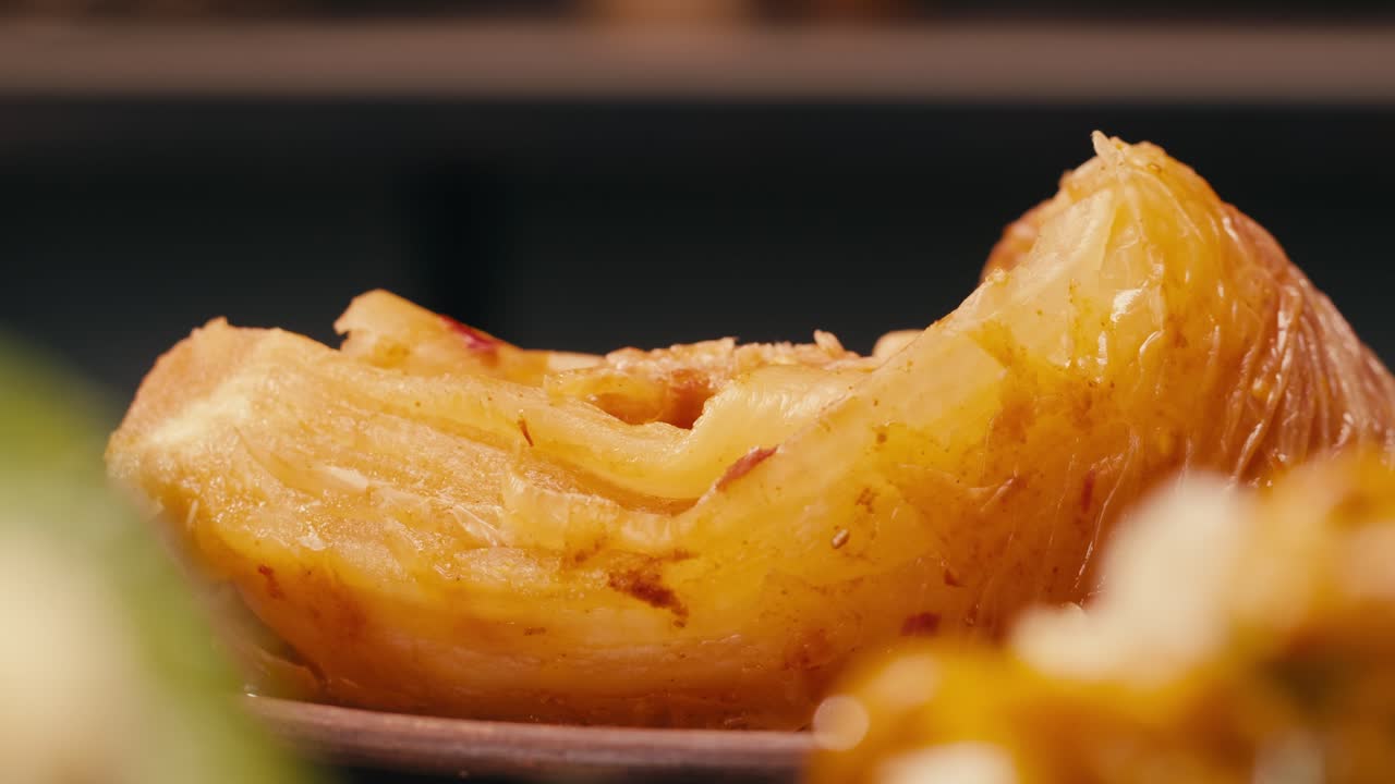 Fermented spicy cabbage kimchi with on plate close-up. Preservation of vegetables in glass jars. Fermentation preserved kimchi cabbage with spices macro. Asian cuisine.