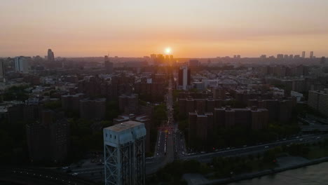 aerial view of sunset above the east 135 street of harlem, in manhattan, nyc