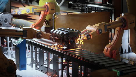 brazos robóticos mueven piezas en un transportador en una fábrica automatizada
