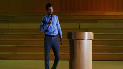 male business executive giving a speech