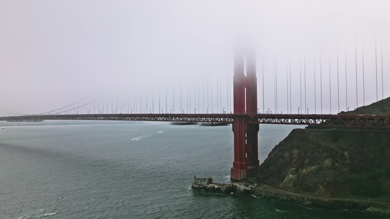 Aerial of the Golden Gate Bridge in San Francisco in a misty day