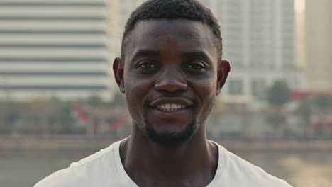 smiling african man in city