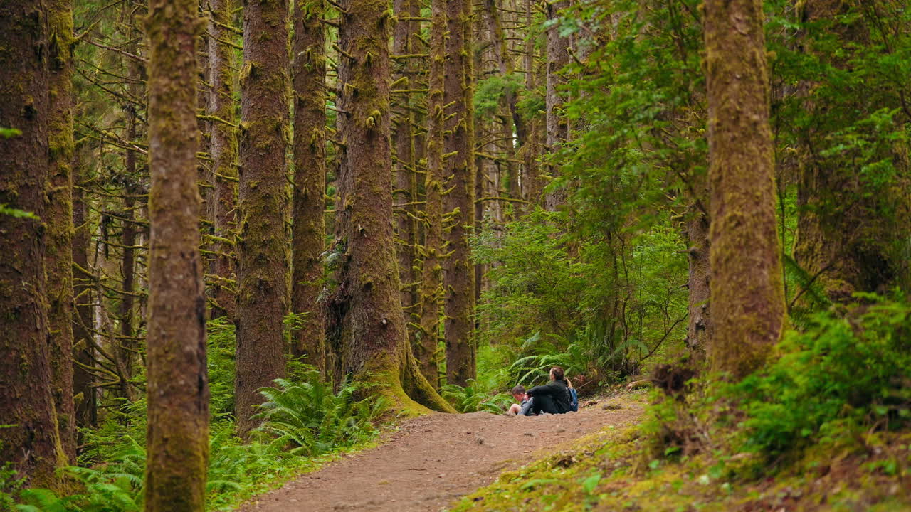 Bonding in nature a mother and kids enjoying time in the forest