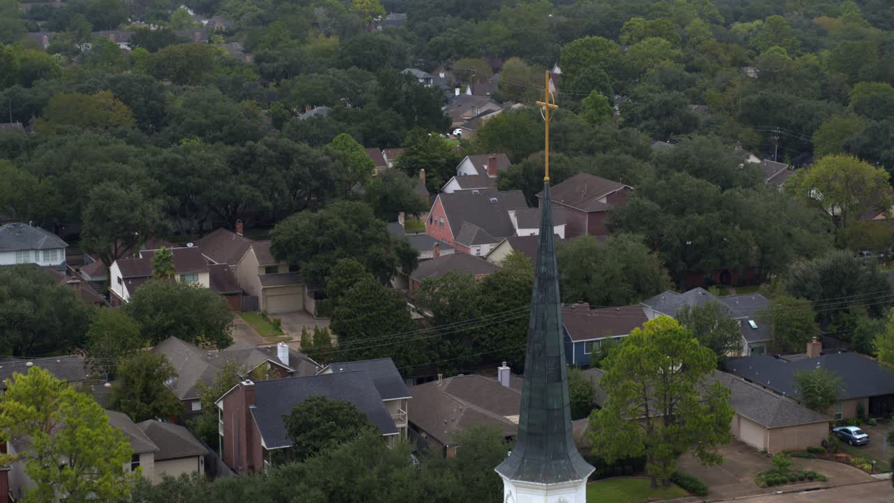 Drone view of a church surrounding by homes in Southwest Houston, Texas